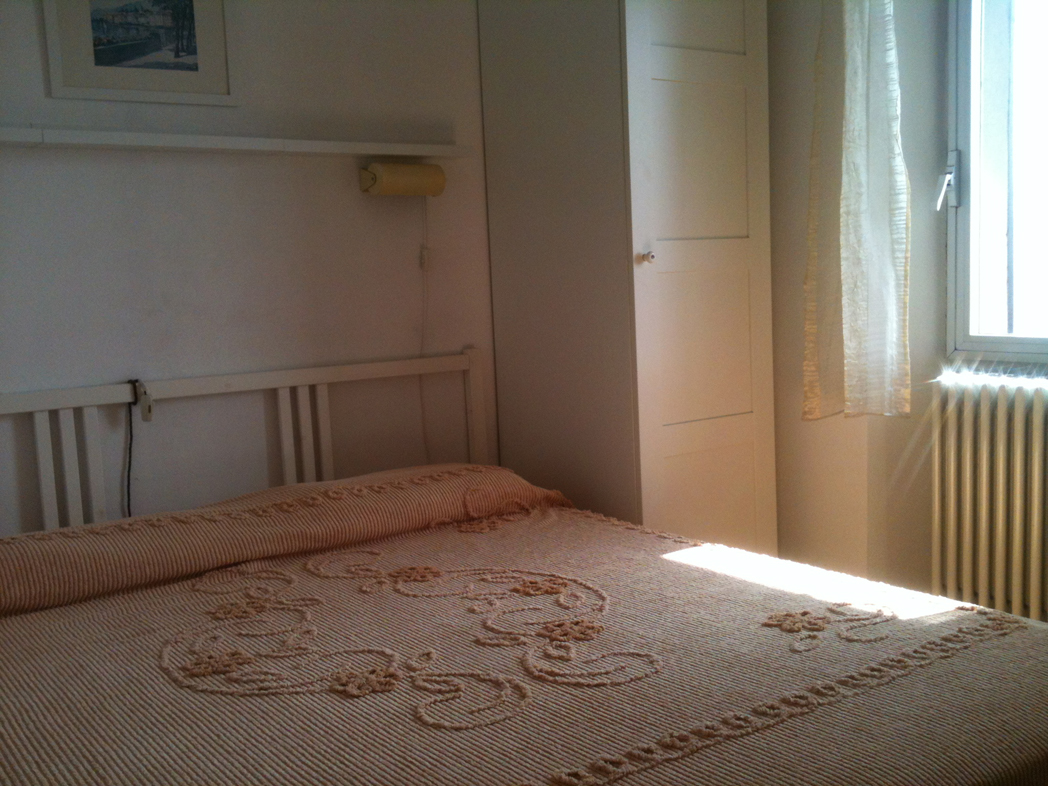 bedroom with king bed harmchair,windows beautiful view lake Como and Menaggio,Bellaggio Varenna,Monte Legnone e grigne,linen provided