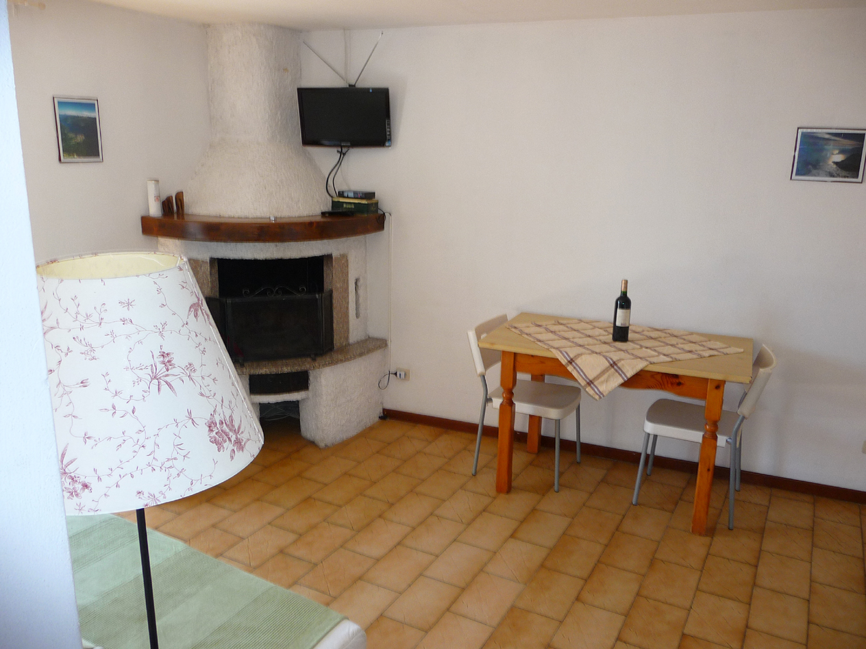 kitchen with stove microwave and fridge,full equiped